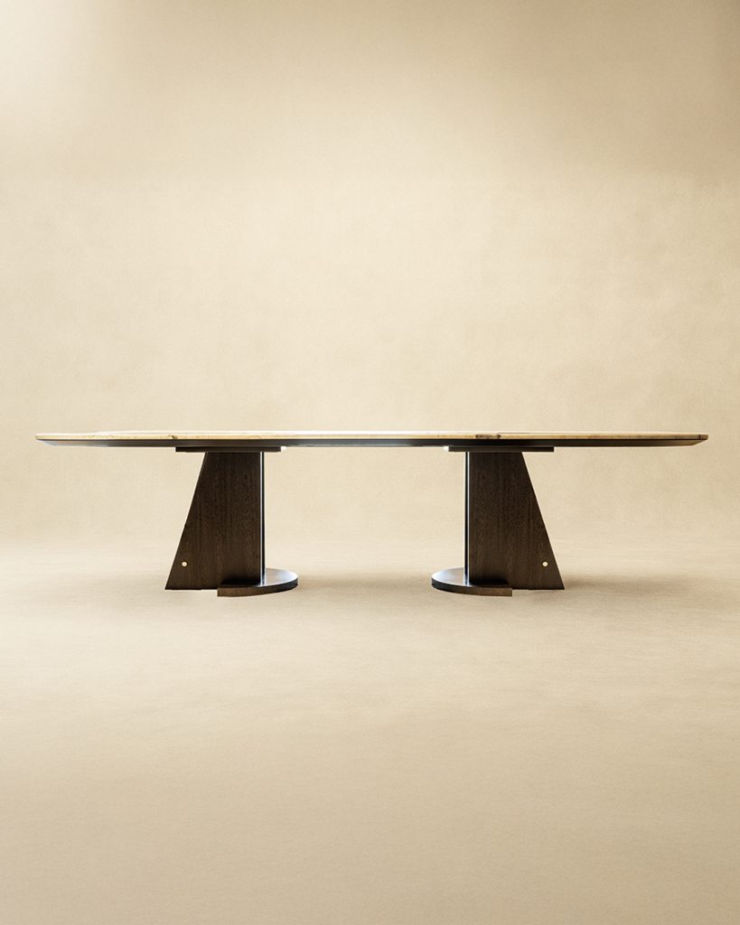Jolie marble dining table by Monography in onyge black veneer with Oyster White marble top